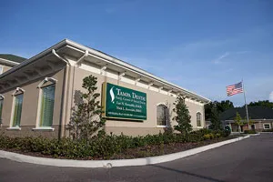 Exterior of Tampa Dental showing sign